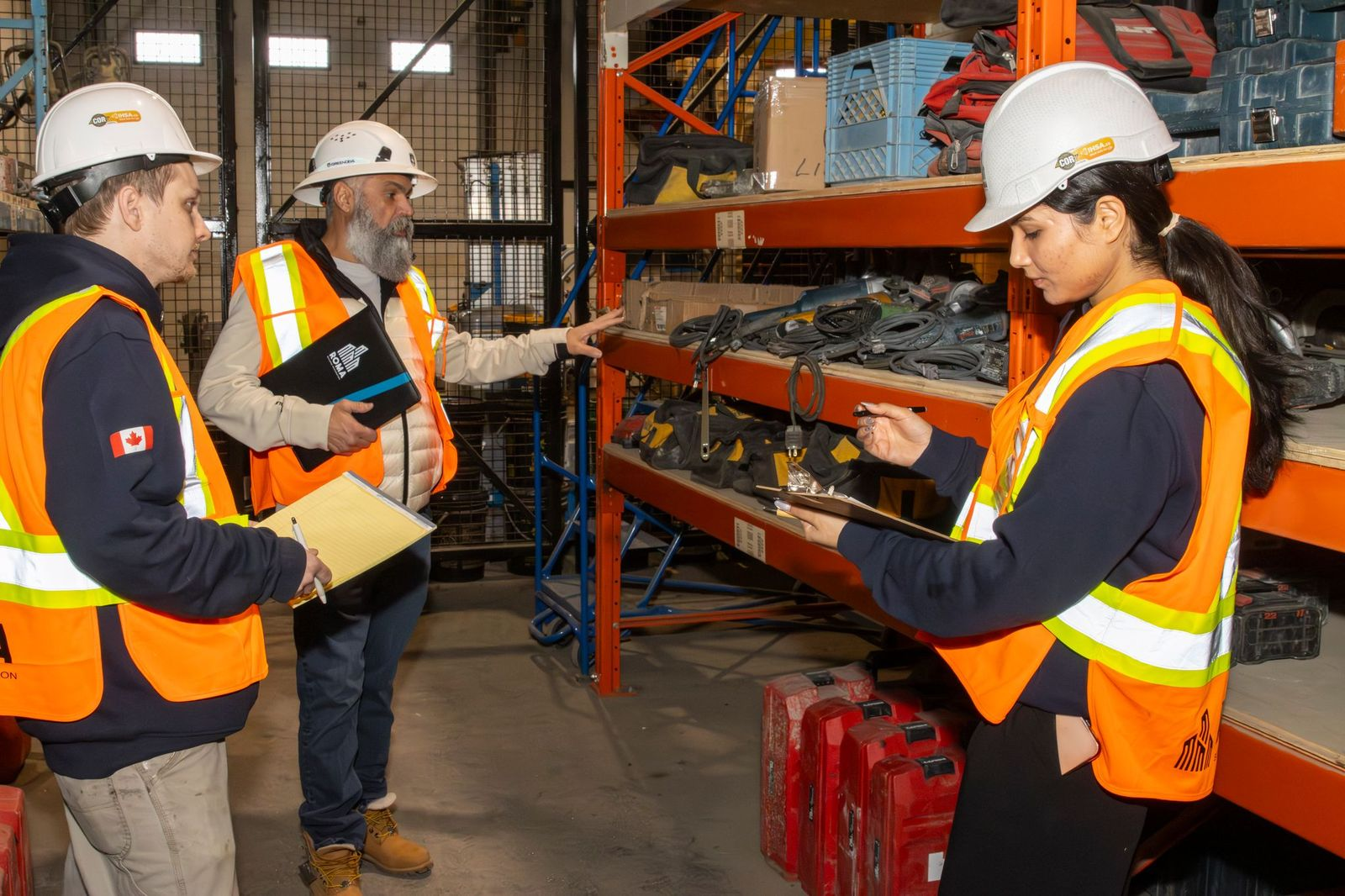 Roma staff reviewing equipment and safety procedures